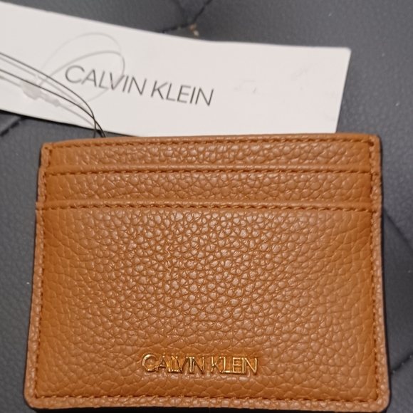 CALVIN KLEIN ID FLAT TAN BROWN LOGO WALLET
MEASURE - Picture 4 of 7